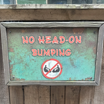 Tuk-Tuk Turmoil No Head-On Bumping Sign