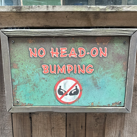 Tuk-Tuk Turmoil No Head-On Bumping Sign
